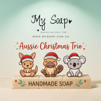 My Soap Aussie Christmas Trio gift set featuring handmade soaps shaped like a kangaroo, platypus, and koala in hats.