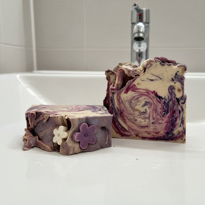 My Soap Sweet Pea & Jasmine handmade soap with purple and cream swirls and floral accents.